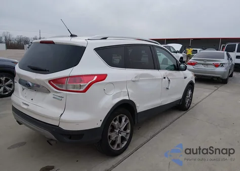 2016 Ford Escape Titanium z USA, uszkodzony, nr VIN 1FMCU0J97GUC78195